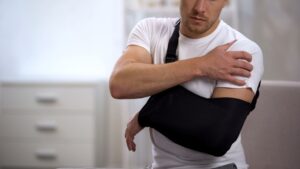 Man with an injured arm is in need of an Oceanside personal injury lawyer